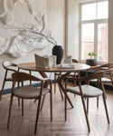 LAKRI Round Dining Table in Solid Wood with Neva Chairs